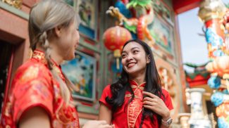 Celebrating chinese new year worship at a shrine cultural gathering urban environment close-up view